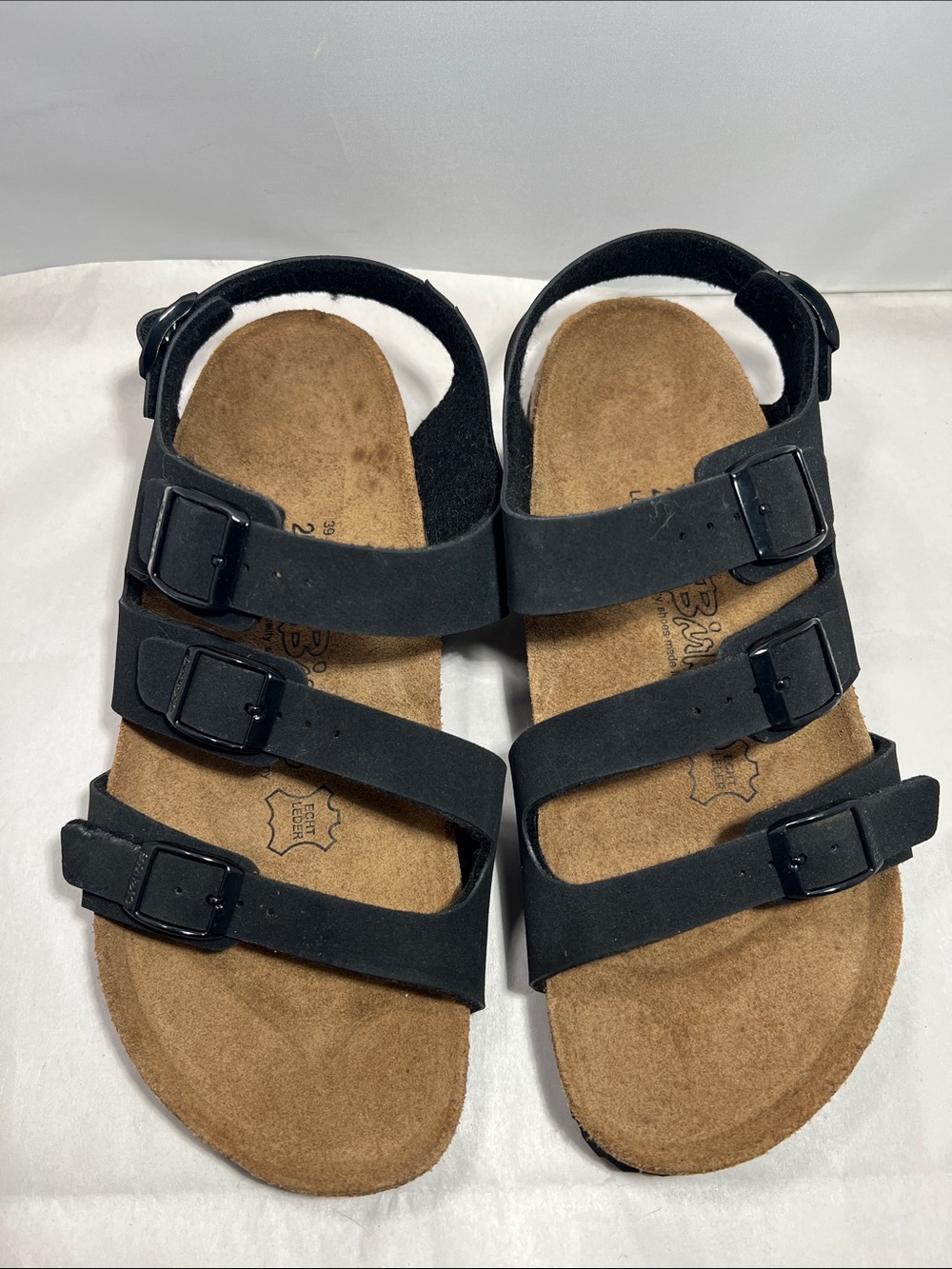 Birki’s Birkenstock  woman Black Triple-Strap Sandal with Buckles